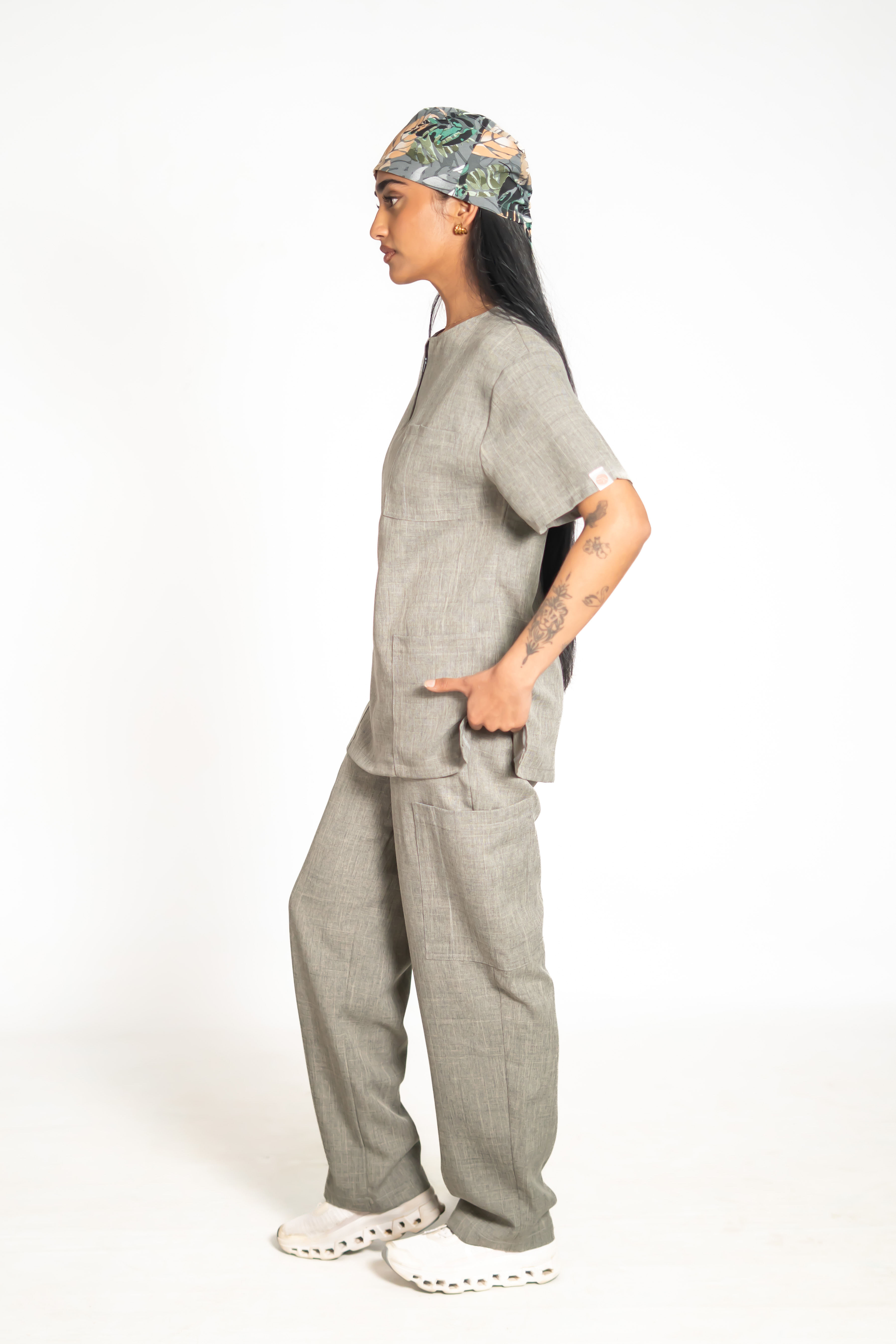 Healthcare professionals in Scrub Atelier linen scrubs with matching scrub caps
